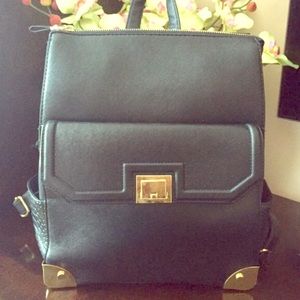 ASOS black backpack with gold hardware